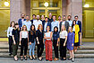 The Hertie School 2019 Executive MPA cohort in two rows on the steps in front of the Hertie School building. Dean Christine Reh and Programme Manager Juliane McCarty are in the front row, center.