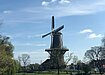A windmill beside a canal in Leiden. 