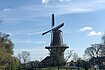 A windmill beside a canal in Leiden. 