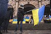A young boy waving a ukrainian flag in the center of a demonstration showing solidarity with Ukraine in Bielefeld, Germany.